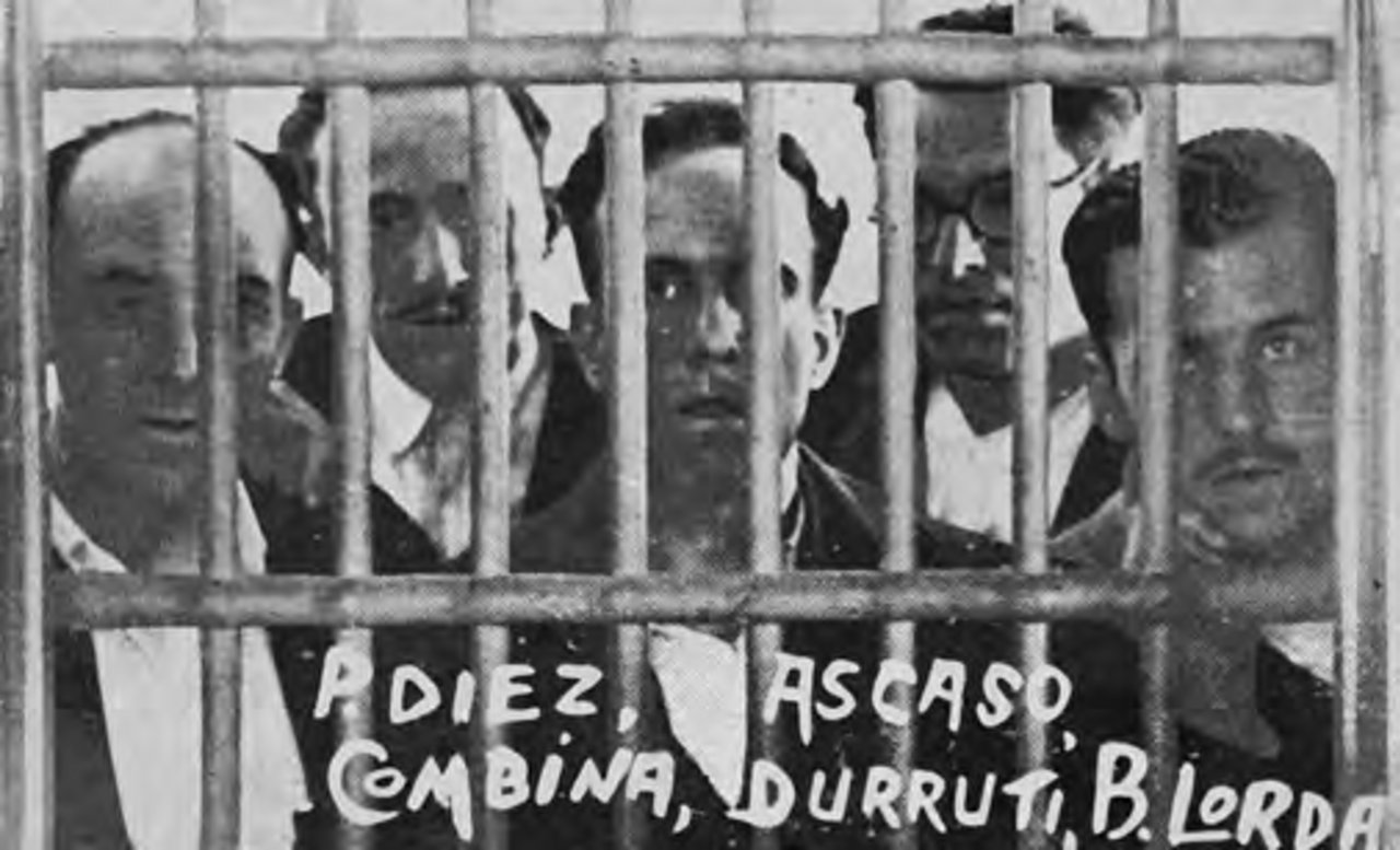 Cinco hombres detrás de los barrotes de una celda, con sus nombres escritos debajo: P. Díez, Ascaso, Combina, Durruti y B. Lorda.